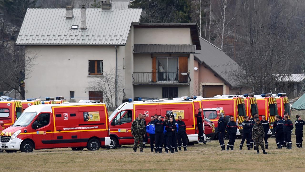 French emergency services workers gather in Seyne, south-eastern France, on March 24, 2015, near the site where a Germanwings Airbus A320 crashed in the French Alps. A German airliner crashed near a ski resort in the French Alps on March 24, killing all 150 people on board, in the worst plane disaster in mainland France in four decades. AFP PHOTO / BORIS HORVAT