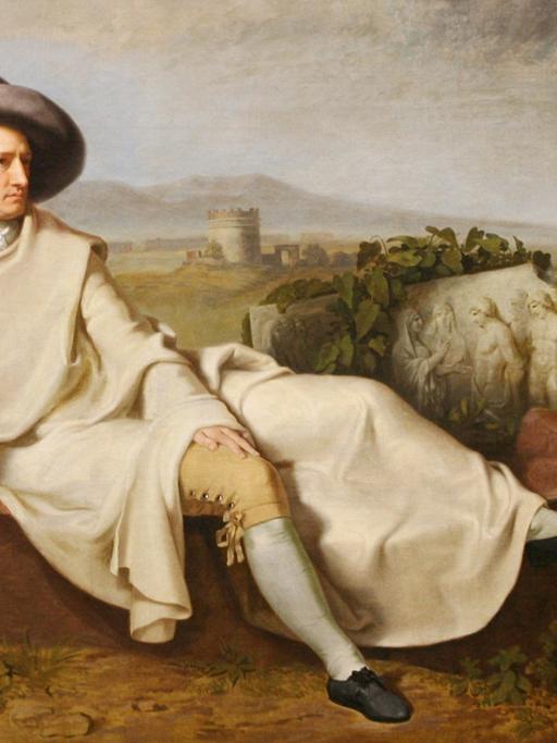 Auf dem Bild "Goethe in der römischen Campagna" von Johann Heinrich Wilhelm Tischbein liegt Goethe hingebettet vor einer italienischen Landschaft
