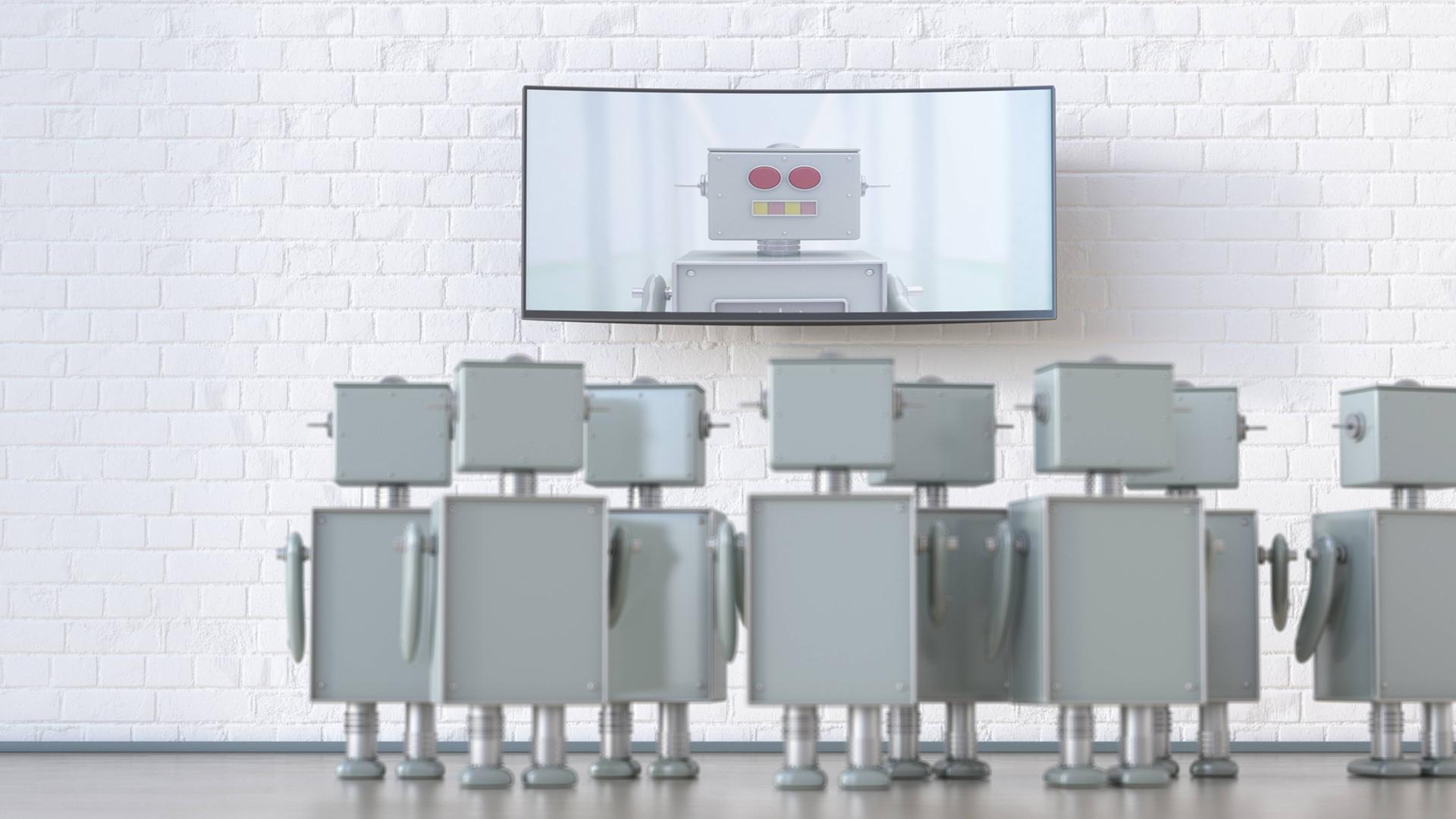 Eine Gruppe von Robotern blickt auf einen Bildschirm mit einem Roboter