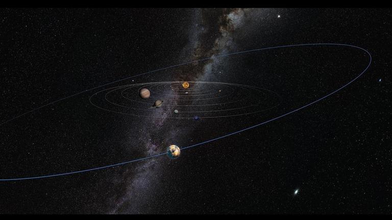 Ein Objekt von der Größe des Planeten Mars könnte für eine auffällige "Krümmung" des Kuipergürtels am Rande des Sonnensystems verantwortlich sein (künstlerische Darstellung)