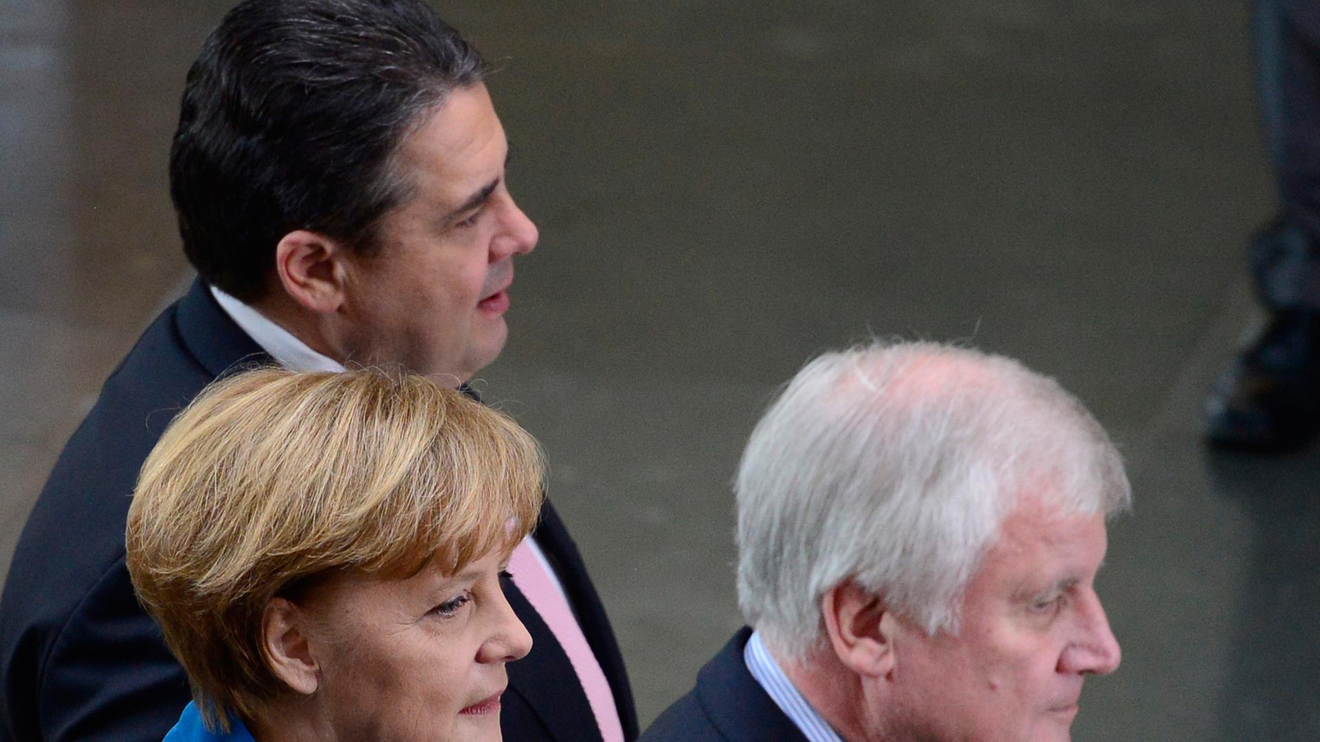 Die drei Parteichefs Angela Merkel, Sigmar Gabriel und Horst Seehofer
