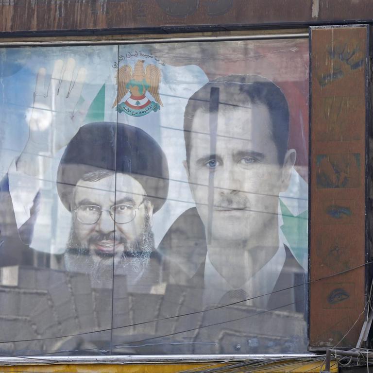 Hassan Narrallah, Chef der libanesischen Hisbollah-Miliz und Syriens Staatschef Bashar al-Assad auf einem Plakat 