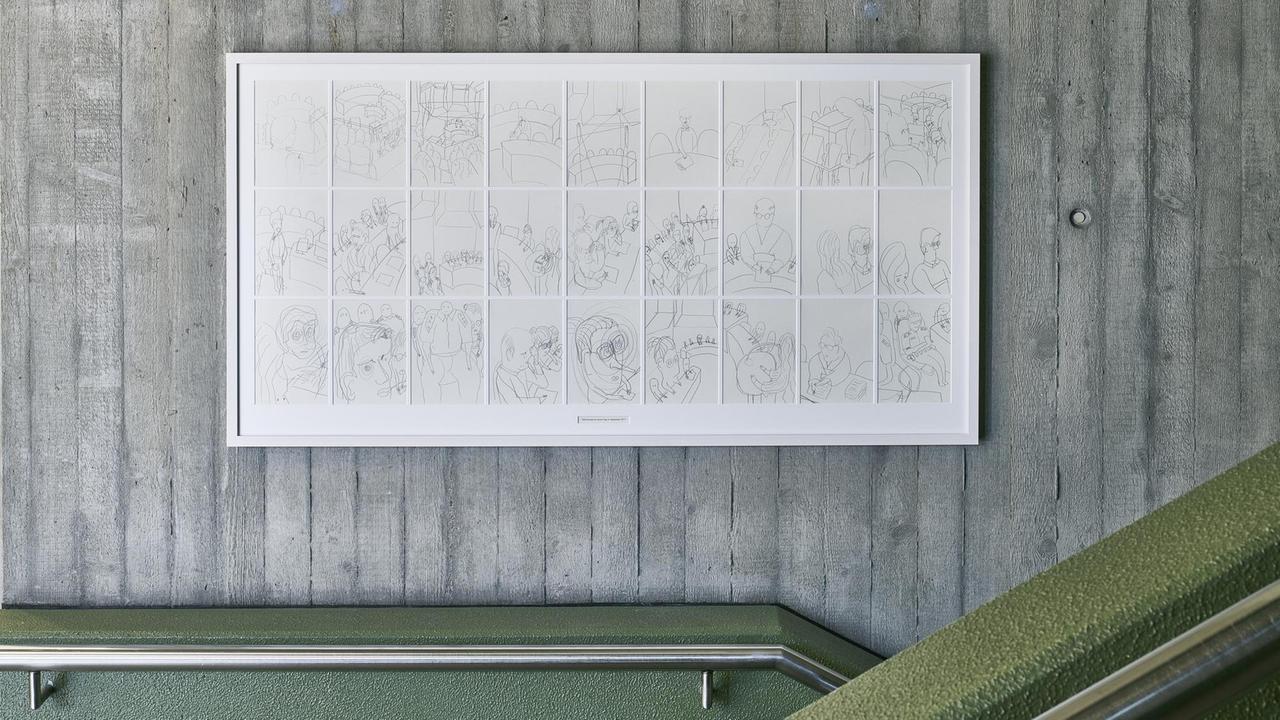 Gerahmte Zeichnungen des NSU-Prozesses hängen an einer Wand.
