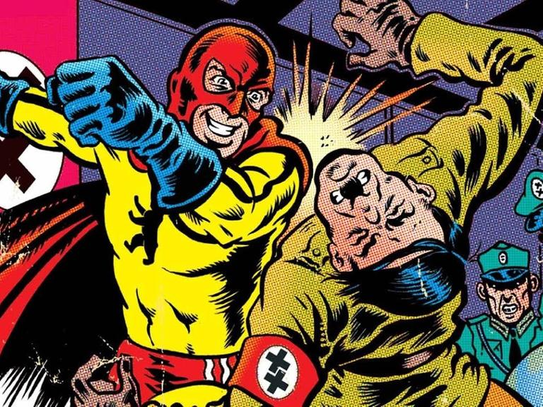  Die Comicfigur Captain Berlin versetzt Adolf Hitler einen Kinnhaken.