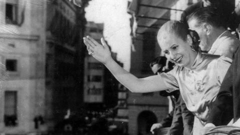Oct. 23, 1950 - Buenos Aires, Argentina - An army colonel who became president of Argentina three times and was founder and leader of the Peronist movement JUAN DOMINGO PERON together with his second wife, Eva, were immensely popular amongst many of the Argentine people and are still considered icons by the Peronist Party. PICTURED: EVA (EVITA) PERON and Juan wave to citizens from a balcony. Buenos Aires Argentina PUBLICATIONxINxGERxONLY - ZUMAk09 OCT 23 1950 Buenos Aires Argentina to Army Colonel Who became President of Argentina Three Times and what Founder and Leader of The Peronist Movement Juan Domingo Peron Together With His Second wife Eva Were immensely Popular amongst MANY of The Argentine Celebrities and are quiet considered Icons by The Peronist Party Pictured Eva Evita Peron and Juan Wave to Citizens from a balcony Buenos Aires Argentina PUBLICATIONxINxGERxONLY ZUMAk09