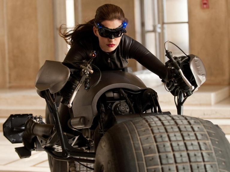 ITAR-TASS: MOSCOW, RUSSIA. JULY 24, 2012. Actress Anne Hathaway as Selina Kyle in a scene from a superhero action film, final part of Christopher Nolan's Batman trilogy _ _The Dark Knight Rises_. (Photo ITAR-TASS / Karo Premiere Film Company) |