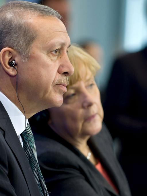 Der türkische Ministerpräsident Recep Tayyip Erdogan und Bundeskanzlerin Angela Merkel bei einer Pressekonferenz in Berlin.