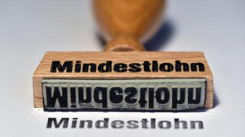 Ein Stempel mit der Aufschrift Mindestlohn