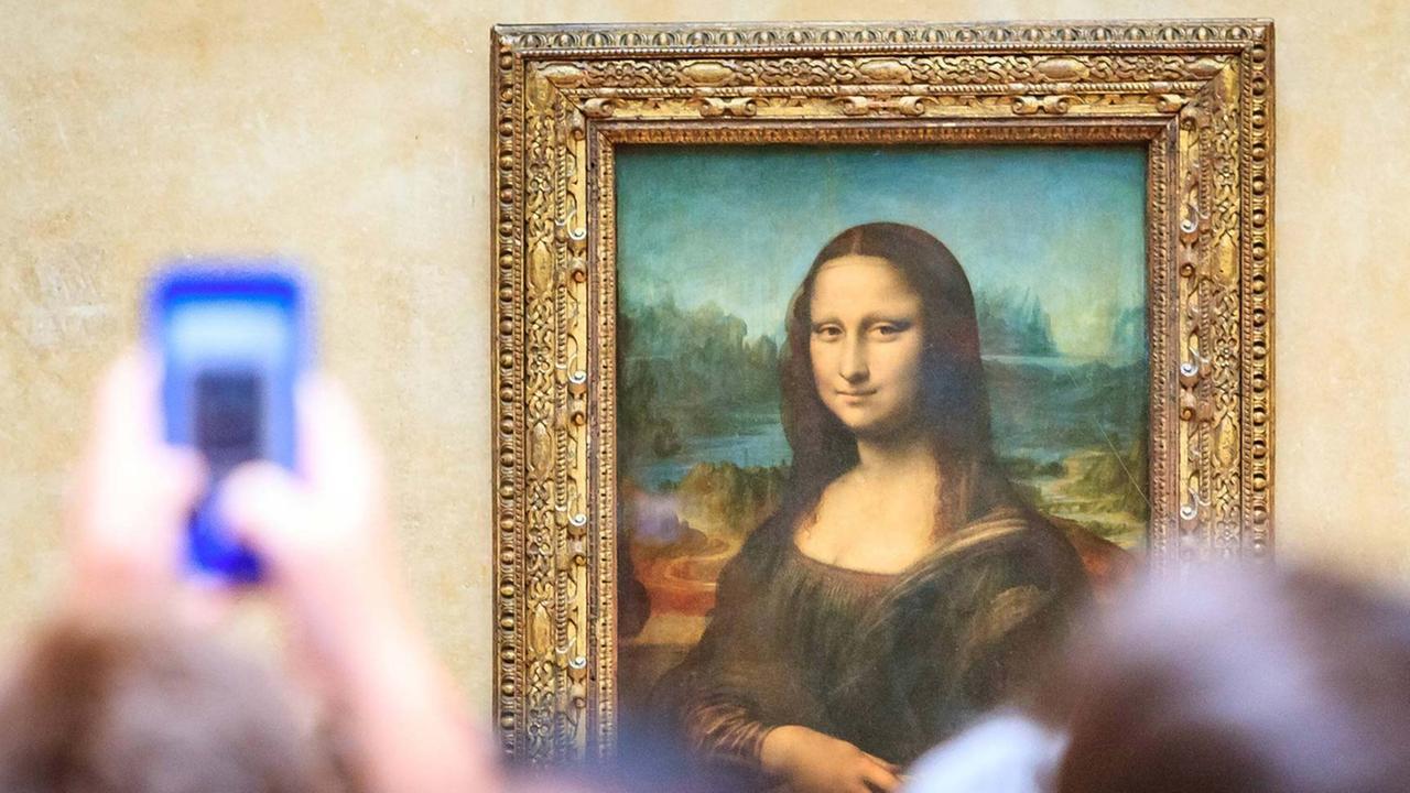 Das weltberühmte Ölgemälde "Mona Lisa" von Leonardo da Vinci hängt im Louvre Museum in Paris.
