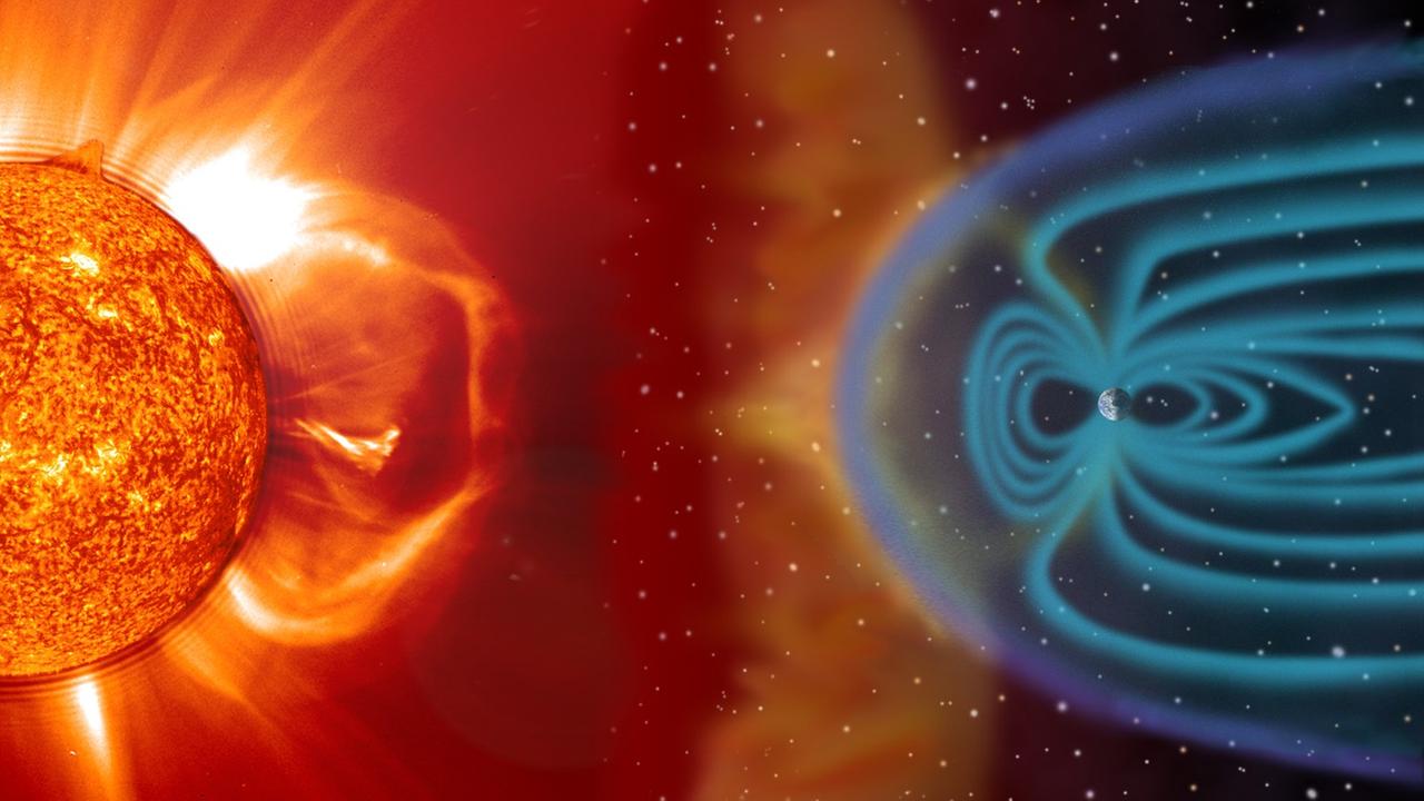 Der Sonnenwind, ein Strom geladener Teilchen von der Sonne, beeinflusst das Erdmagetfeld (Darstellung nicht maßstabsgetreu