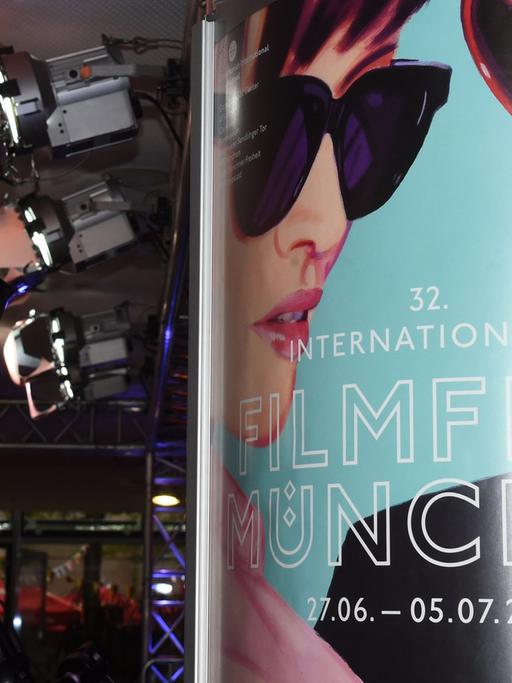 Ein Plakat des 32. Filmfest München, aufgenommen am 27.06.2014 im Mathäser Filmpalast in München (Bayern). Das Filmfest München findet vom 27.06. bis 05.07.2014 statt. Foto: Felix Hörhager