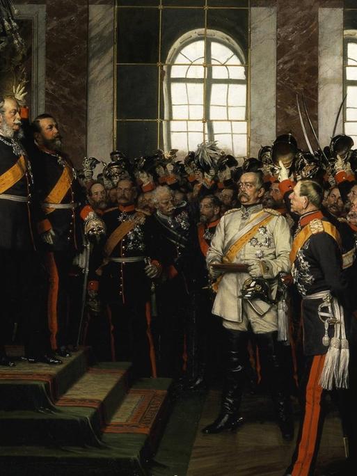 18. Januar 1871: König Wilhelm I. von Preußen wird im Spiegelsaal des Schlosses von Versailles zum Deutschen Kaiser ausgerufen. Die Proklamierung des Deutschen Kaiserreiches. Gemälde, 1885, von Anton von Werner (18431915). Öl auf Leinwand, 167 × 202 cm. (3., sog. Friedrichsruher Fassung). Friedrichsruh, Bismarck-Museum.