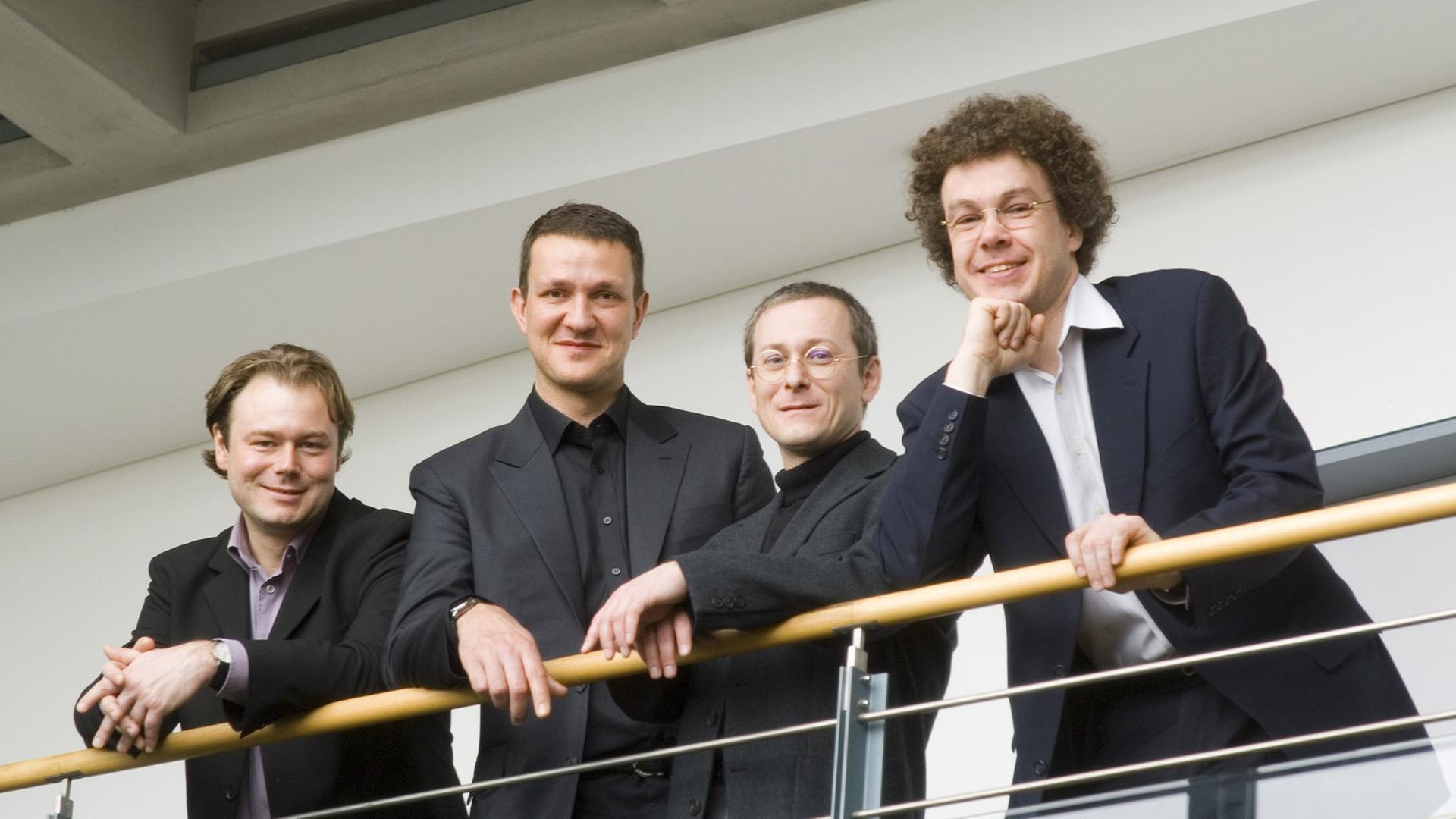Das Foto zeigt die vier Musiker des Leipziger Streichquartetts im Jahre 2014.