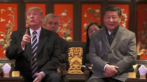 US-Präsident Donald Trump und Chinas Präsident Xi Jinping bei einer Opernvorstellung in der Verbotenen Stadt in Peking