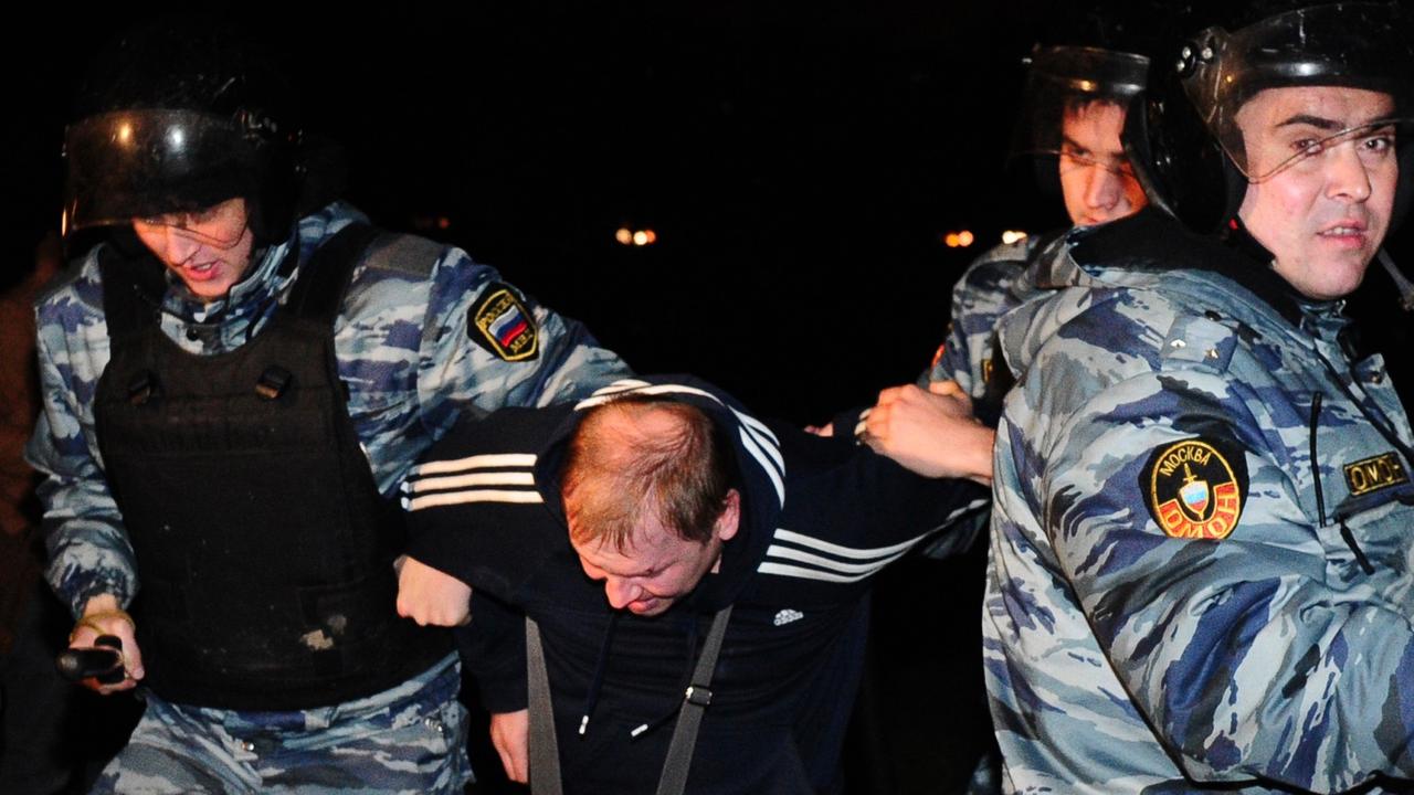 ITAR-TASS: MOSCOW, RUSSIA. OCTOBER 13, 2013. The riot police detain a protester during a rally in Biryulyovo, a district in Moscow’s south, where people are protesting over the murder of Yegor Shcherbakov, 25, attributed to migrant workers. (Photo ITAR-TA ITAR-TASS: MOSCOW, RUSSIA. OCTOBER 13, 2013. The riot police detain a protester during a rally in Biryulyovo, a district in Moscow’s south, where people are protesting over the murder of Yegor Shcherbakov, 25, attributed to migrant workers. (Photo ITAR-TA
