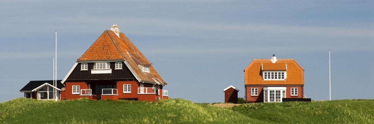Häuser auf einer Düne in Lönstrup, Jütland, Dänemark