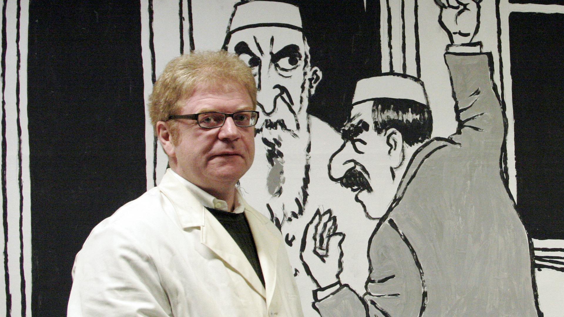 Der Karikaturist Achim Greser vor einer Plakatwand im Frankfurter U-Bahnhof am Willy-Brandt-Platz, die einen Mann mit "orientalisch-mediterraner Leidenschaft" zeigt, der in der U-Bahn seinem Gegenüber "Dschihad" (Heiliger Krieg) zuruft - die Antwort lautet "Gesundheit". Der Karikaturist Achim Greser vor einer Plakatwand im Frankfurter U-Bahnhof am Willy-Brandt-Platz, die einen Mann mit "orientalisch-mediterraner Leidenschaft" zeigt, der in der U-Bahn seinem Gegenüber "Dschihad" (Heiliger Krieg) zuruft - die Antwort lautet "Gesundheit".