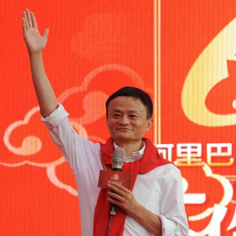Jack Ma, chairman of Alibaba Group, witnesses a group wedding ceremony on May 9, 2014 in Hangzhou, Zhejiang Province of China