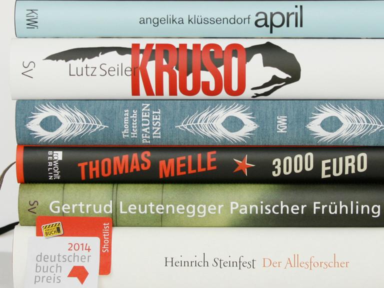 Das Bild zeigt die Buchrücken der Finalisten auf der Shortlist des Deutschen Buchpreises 2014.