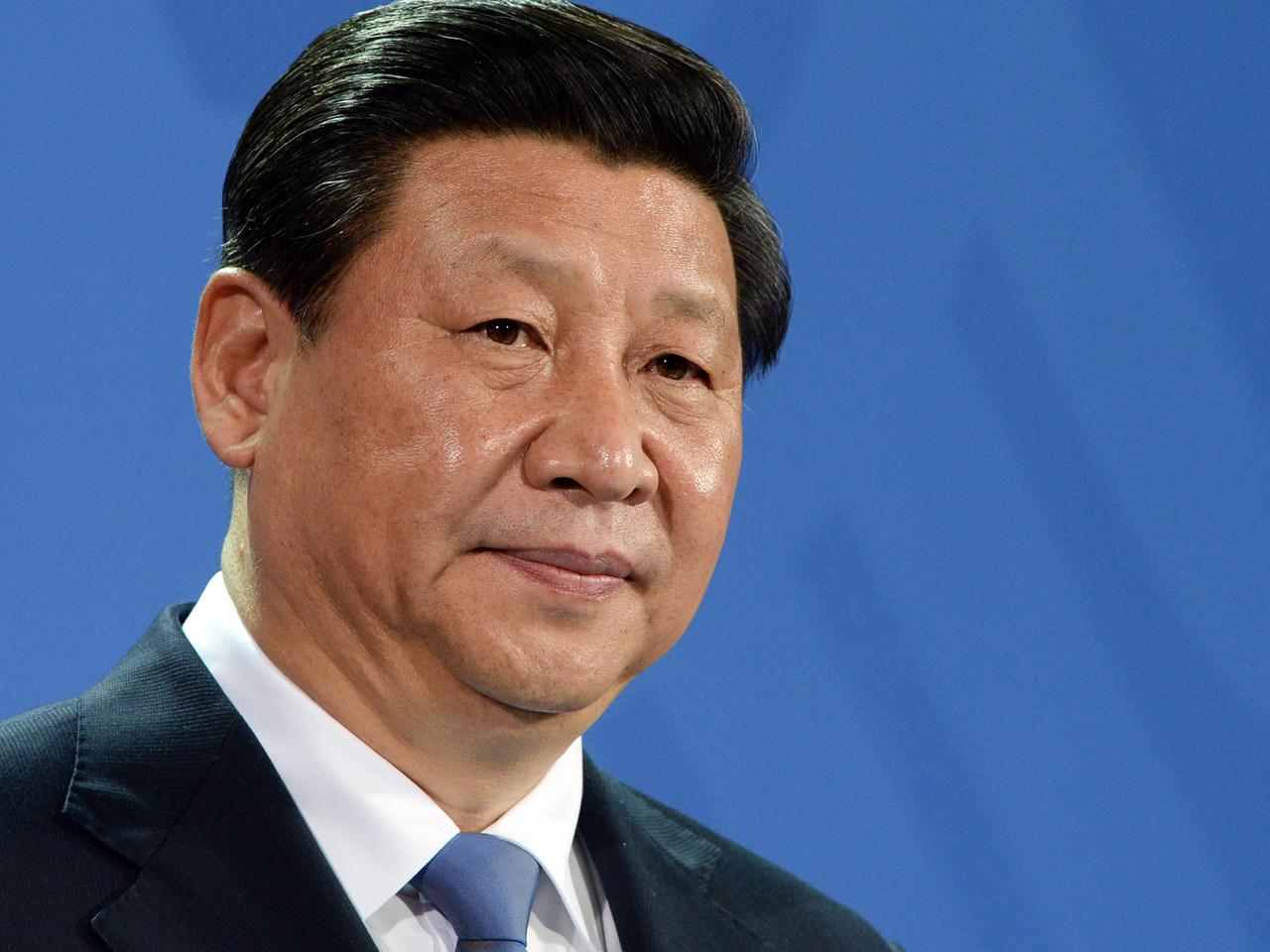 Der chinesische Staats- und Parteichef Xi Jinping, aufgenommen am 28.03.2014 während einer gemeinsamen Pressekonferenz mit Bundeskanzlerin Merkel.