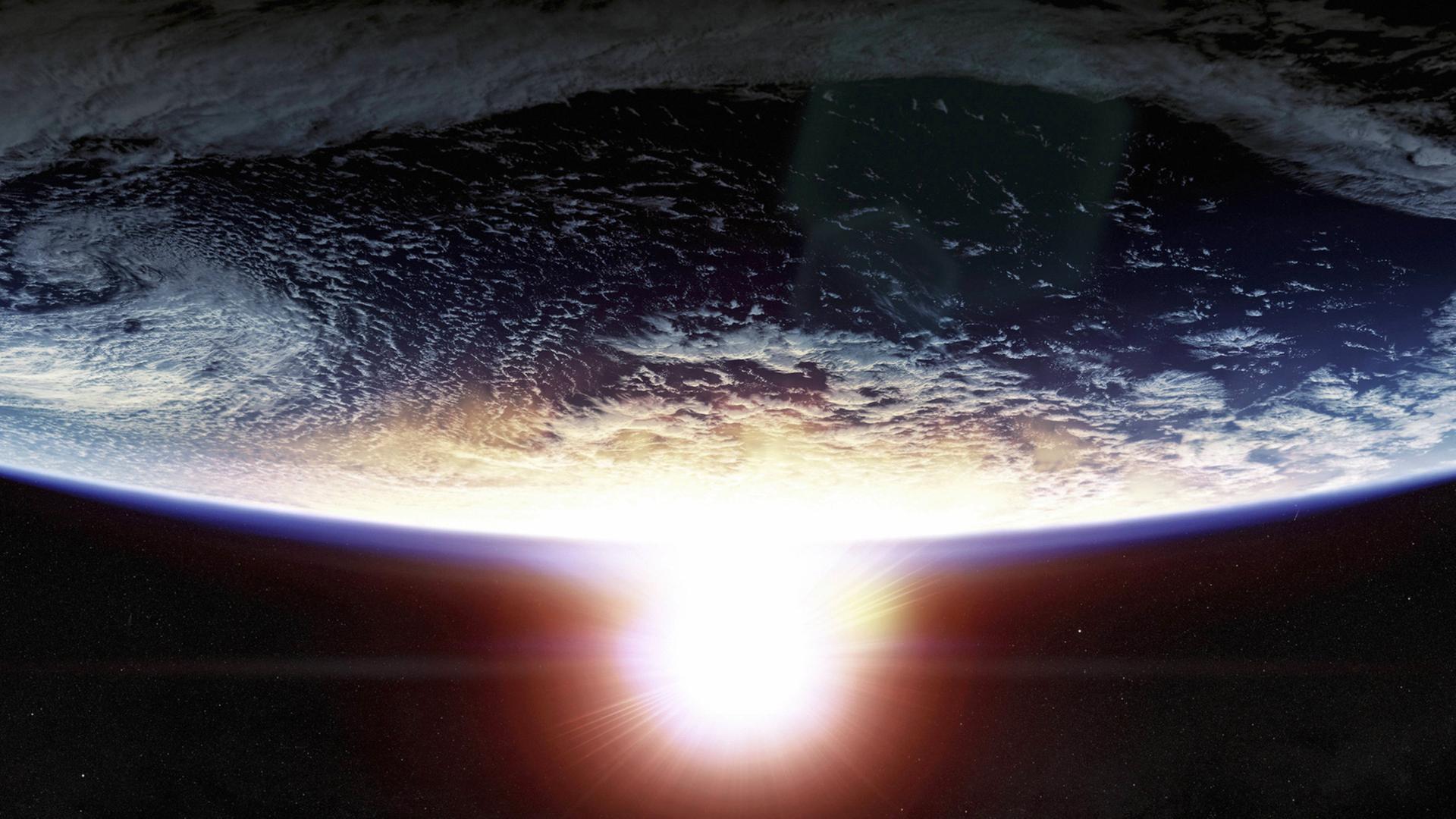 Vom Weltraum aus betrachtet: ein Sonnenuntergang über der Erde