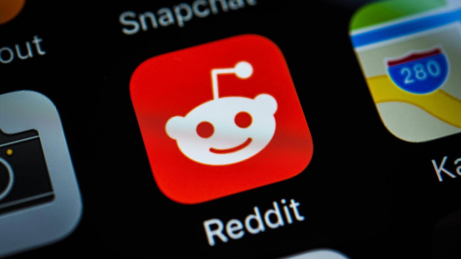 Das Bild zeigt das Icon der App "Reddit", ein Gesicht mit einer Antenne auf dem Kopf. Das Bild zeigt das Icon der App "Reddit", ein Gesicht mit einer Antenne auf dem Kopf.