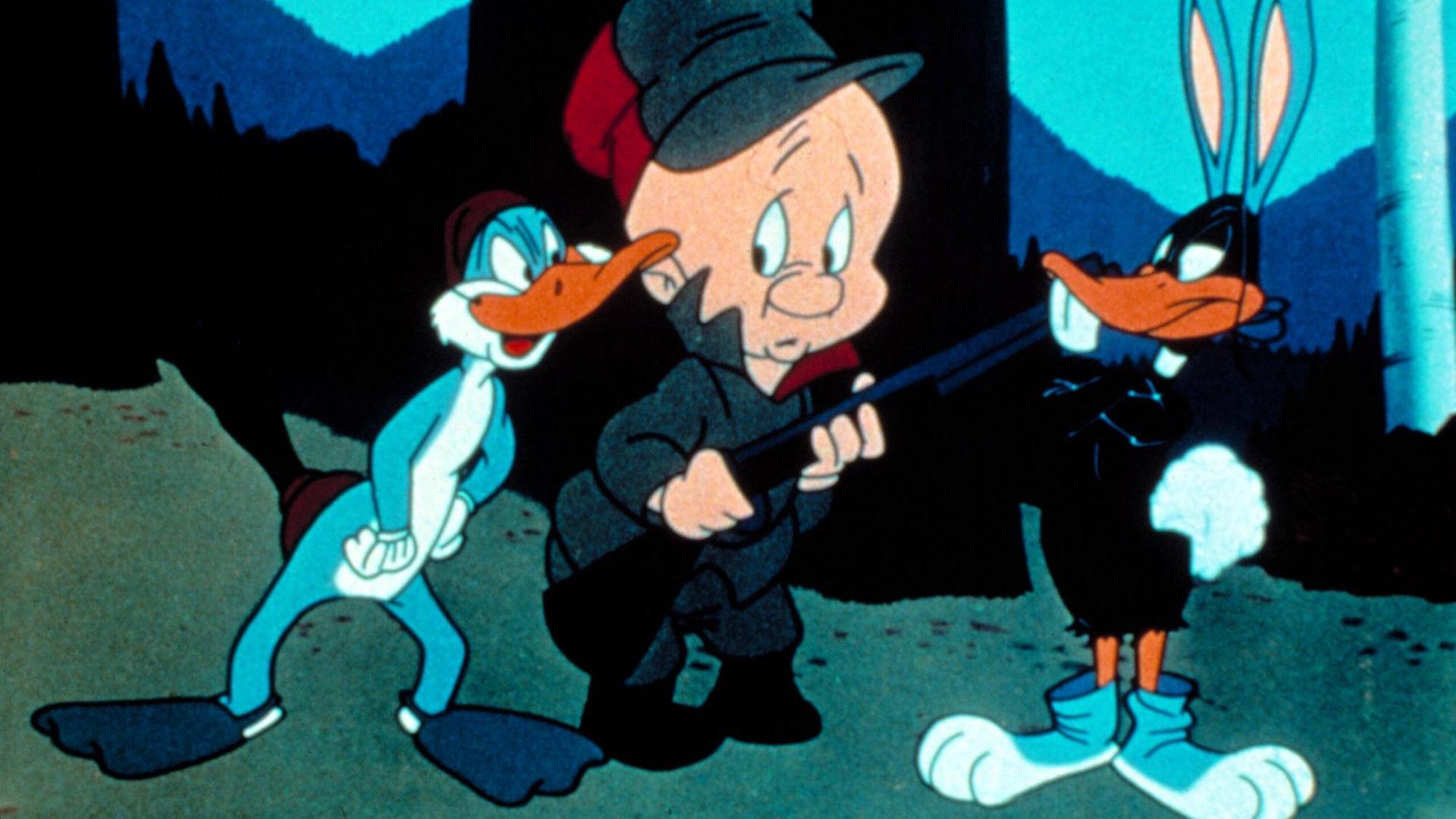 Bugs Bunny mit Entenfüssen und Duffy Duck mit Hasenohren verwirren den Jäger.
