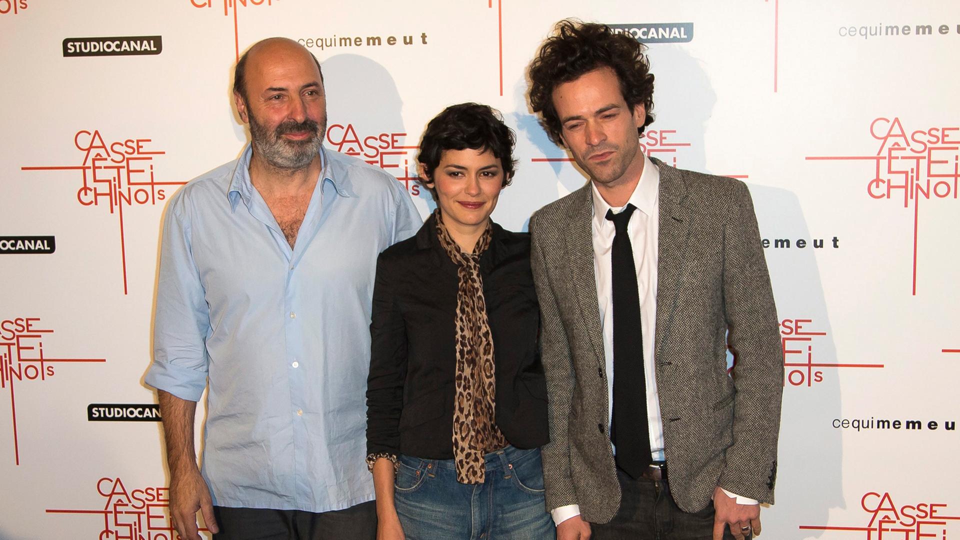 Der französische Regisseur Cedric Klapisch und die Hauptdarsteller von "Beziehungsweise New York" Romain Duris (re) und Audrey Tautou (li)