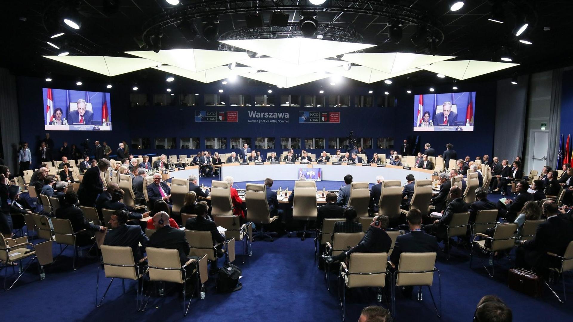 epa05415712 A general view on the NATO and Georgia Foreign Ministers Commission at the NATO Summit at the National Stadium in Warsaw, Poland, 08 July 2016. The NATO Warsaw Summit which is expected to decide about military reinforcements on NATO territory in Central-East Europe takes place on 08 and 09 July. About 2,000 delegates, including 18 state heads, 21 prime ministers, 41 foreign ministers and 39 defence ministers will take part in the Summit. EPA/PAWEL SUPERNAK POLAND OUT +++(c) dpa - Bildfunk+++