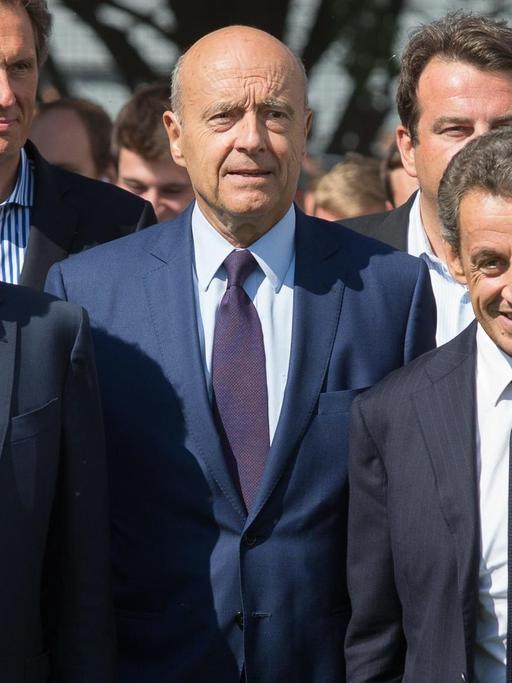 Blick auf die Präsidentschaftskandidaten der Konservativen für die Wahl 2017 Francois Fillon, Alain Juppé und Nicolas Sarkozy beim Treffen der Republikaner im Seebad La Baule 2015