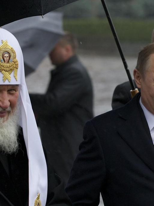 Präsident Wladimir Putin mit dem Patriarchen der RUssisch Orthodoxen Kirche, Kyrill I.