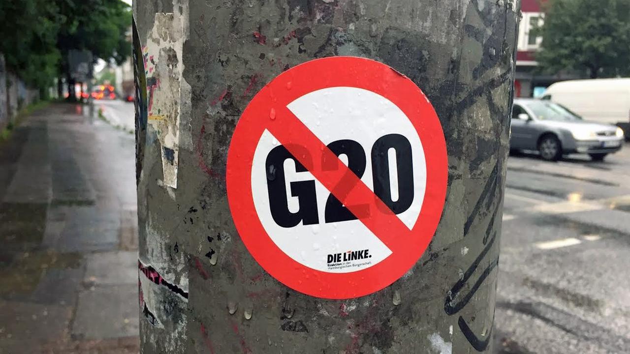 Ein Logo protestiert gegen den G20-Gipfel.