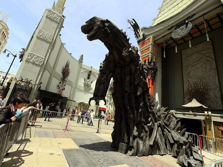 A six meter plus tall Gozilla sculpture is unveiled at the TCL Chinese Theatre in Hollywood, California, USA, 09 May 2014 to promote the release of the movie 'Godzilla' in the United States.