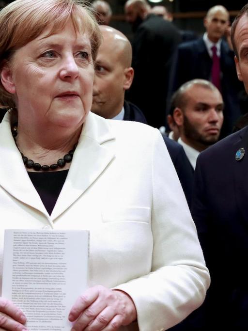 Angela Merkel neben Emmanuel Macron.