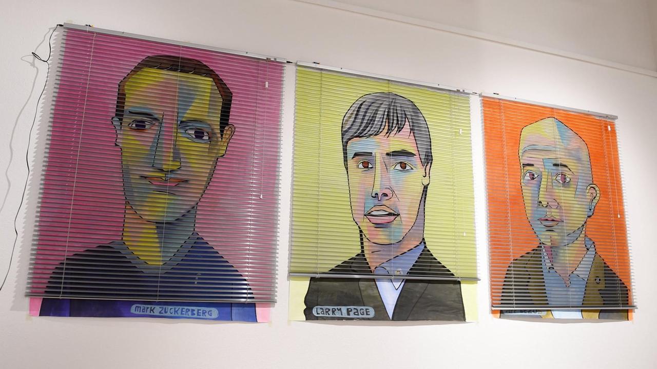 Drei Bilder des Pop-Art-Künstlers Jim Avignon. Sie zeigen: Facebook-Gründer Mark Zuckerberg, Google-Gründer Larry Page und Amazon-Gründer Jeff Bezos.