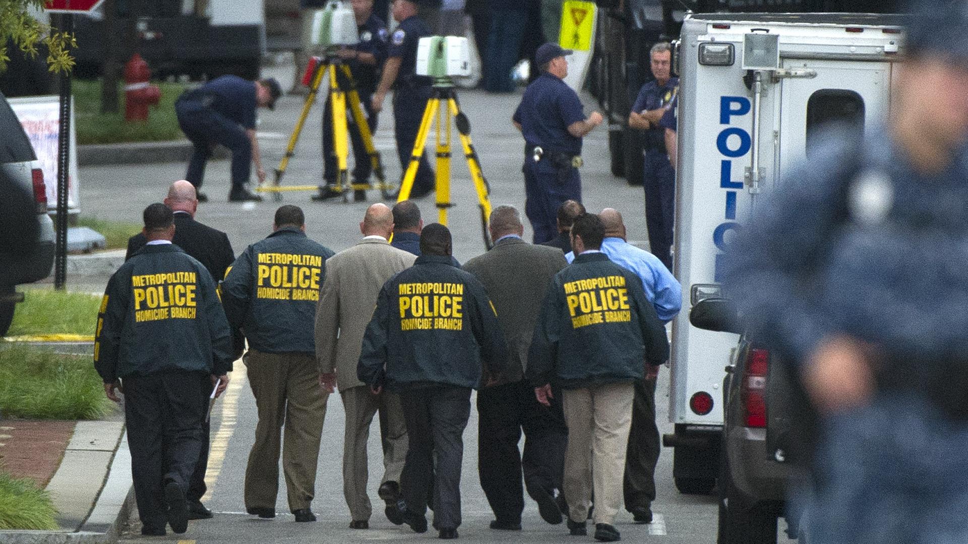 Image #: 24359548 D.C. Metropolitan Police Officers work the crime scene at the Naval Yard in Washington, D.C. on September 16, 2013. Earlier this morning a gunman opened fire inside the Naval complex killing at least 12. UPI/Kevin Dietcsh /LANDOV Kei Image #: 24359548 D.C. Metropolitan Police Officers work the crime scene at the Naval Yard in Washington, D.C. on September 16, 2013. Earlier this morning a gunman opened fire inside the Naval complex killing at least 12. UPI/Kevin Dietcsh /LANDOV Kei