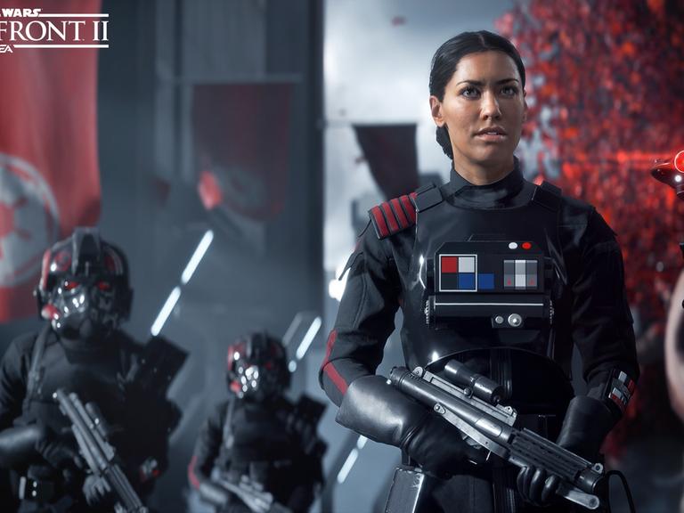 Screenshot aus Star Wars Battlefront 2 - eine imperiale Soldatin steht mit ihren unbehelmten Kollegen in Bereitschaft