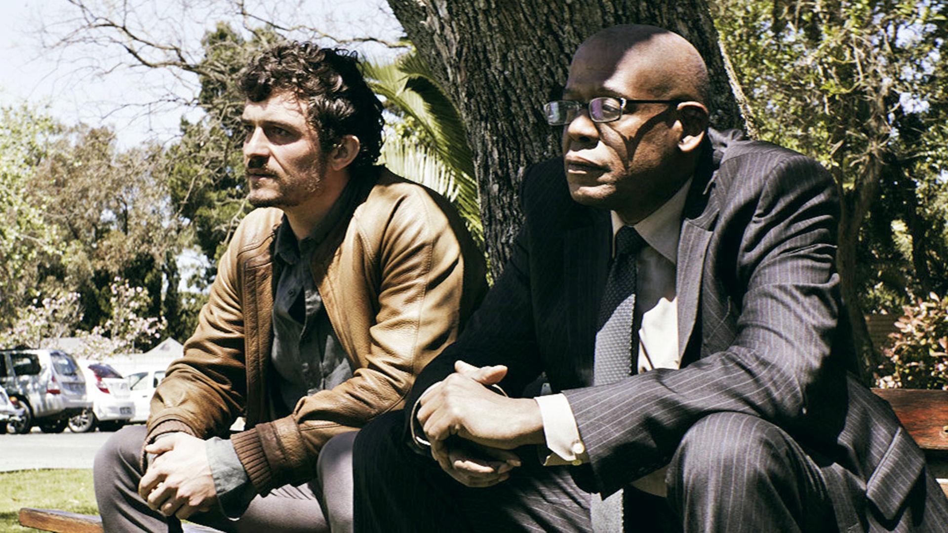 Orlando Bloom (l) als Brian Epkeen und Forest Whitaker als Ali Sokhela in einer Szene des Kinofilms "Zulu"