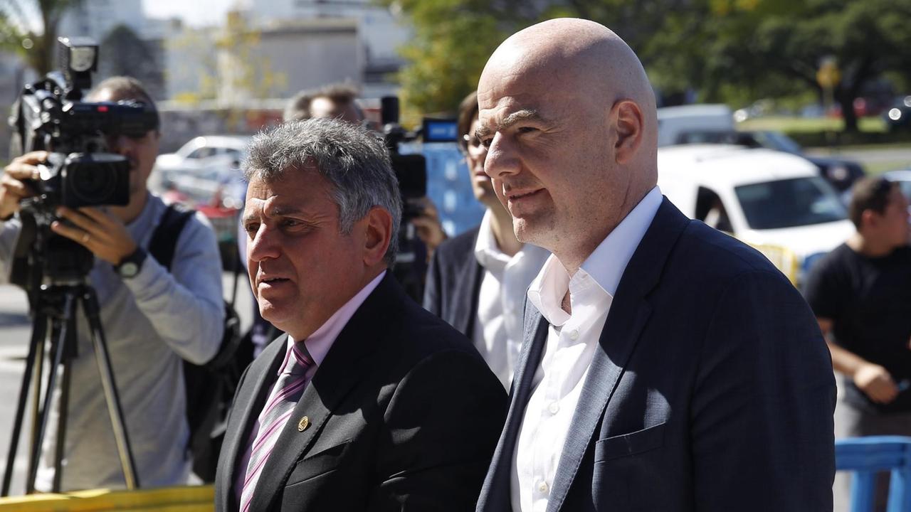epa05235229 FIFA President, Gianni Infantino (R) and Uruguay's President of the Soccer Association, Wilmar Valdez (L), arrive at the Museum inside the Centenario Stadium in Montevideo, Uruguay, 29 March 2016. Infantino is on an official tour of Latin America, which is taking him to Bolivia, Paraguay, Uruguay and Colombia. Infantino was elected as FIFA President on 26 February 2016. EPA/Juan Ignacio Mazzoni |