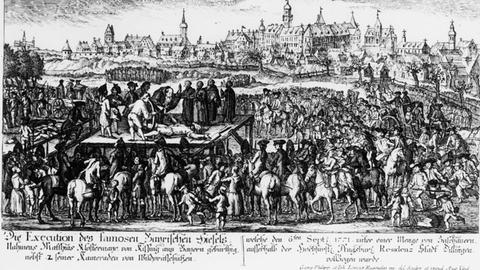 Ein zeitgenössischer Kupferstich von Georg Philipp Rugendas zeigt die Hinrichtung des "Bayerische Hiasl", Matthias Klostermayer 1771 in Dillingen 1-H828-E1771-10 (89272) 'Die Execution des famosen Bayrischen Hiesels (...)' Hiesel, Bayerischer Hiesel, eigentl. Matthias Klostermayer; Räuberführer und Wildschütz; 1736-1771. - 'Die Execution des famosen Bayrischen Hiesels (...)'. (Dillingen, 6. September 1771; Tod durch Rädern). Kupferstich, zeitgenössisch, von Georg Philipp Rugendas (1771-74) und Johann Lorenz Rugendas (1730-99).