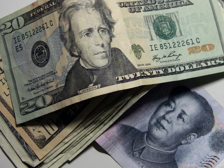 Konterfei von US-Präsident Jackson und Mao Zedong auf US-amerikanischer 20-Dollar-Note und chinesischem 10-Renminbi-Schein.