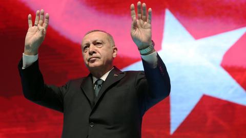 Turkish President Recep Tayyip Erdogan reacts during a meeting of his ruling Justice and Development Party in Ankara, Turkey, on March 2, 2020.