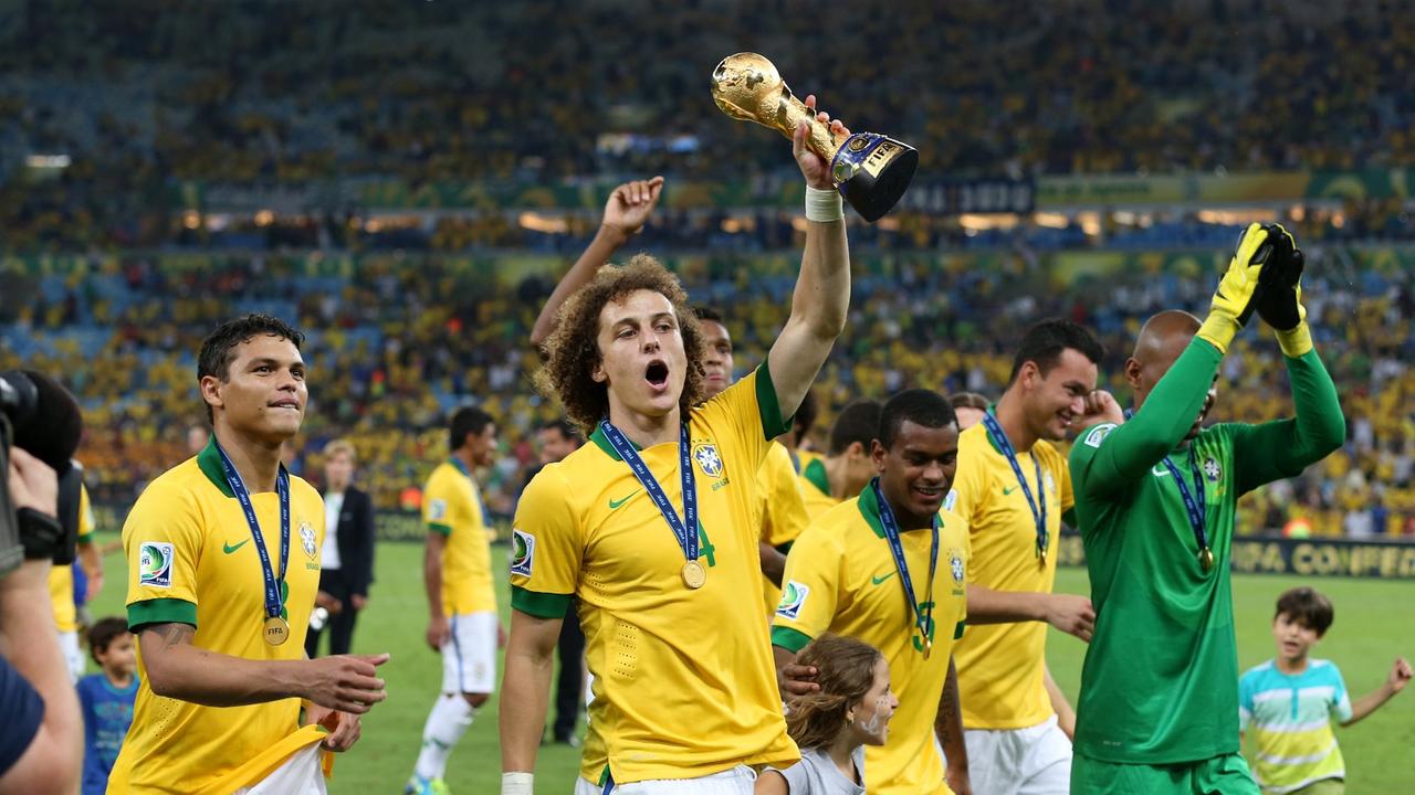 30th June 2013 - FIFA Confederations Cup 2013 Final - Brazil v Spain - David Luiz of Brazil celebrates with the trophy - Photo: Simon Stacpoole / Offside. 30th June 2013 - FIFA Confederations Cup 2013 Final - Brazil v Spain - David Luiz of Brazil celebrates with the trophy - Photo: Simon Stacpoole / Offside.