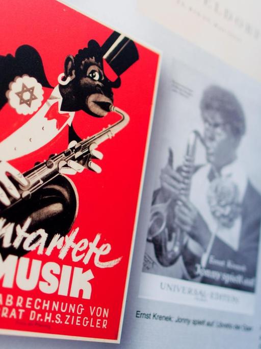 Verschiedene Bilder sind am 06.01.2014 in der Ausstellung "Entartete Musik" in der Tonhalle in Düsseldorf (Nordrhein-Westfalen) auf einer Stellwand zu sehen.