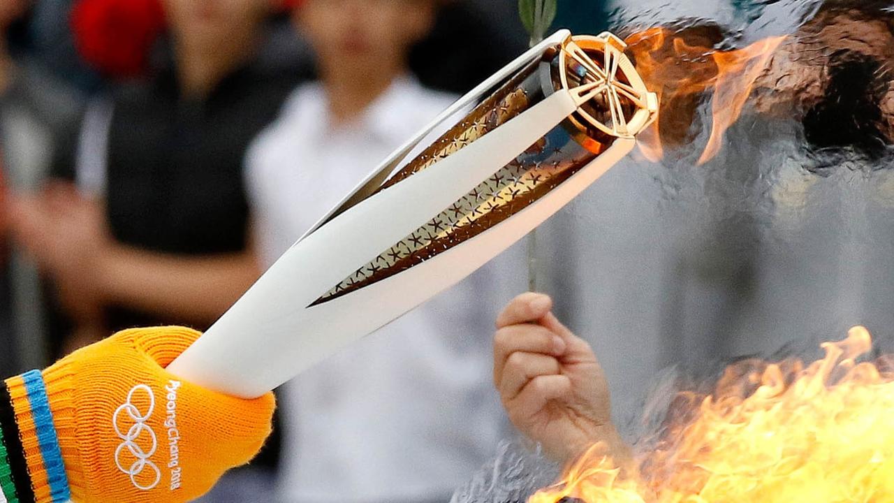 Das Bild zeigt die Olympische Flamme.