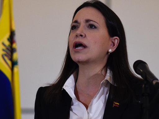 Venezuelan opposition ex-congresswoman Maria Corina Machado delivers a press conference in Caracas on June 29, 2018. - Opposition leader Maria Corina Machado denied Friday being involved in an alleged military plot to overthrow Venezuelan President Nicolas Maduro. (Photo by Federico PARRA / AFP)
