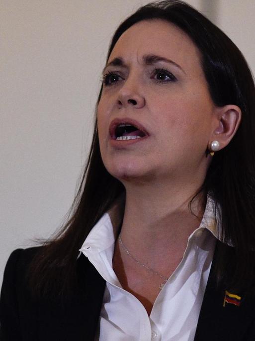 Venezuelan opposition ex-congresswoman Maria Corina Machado delivers a press conference in Caracas on June 29, 2018. - Opposition leader Maria Corina Machado denied Friday being involved in an alleged military plot to overthrow Venezuelan President Nicolas Maduro. (Photo by Federico PARRA / AFP)