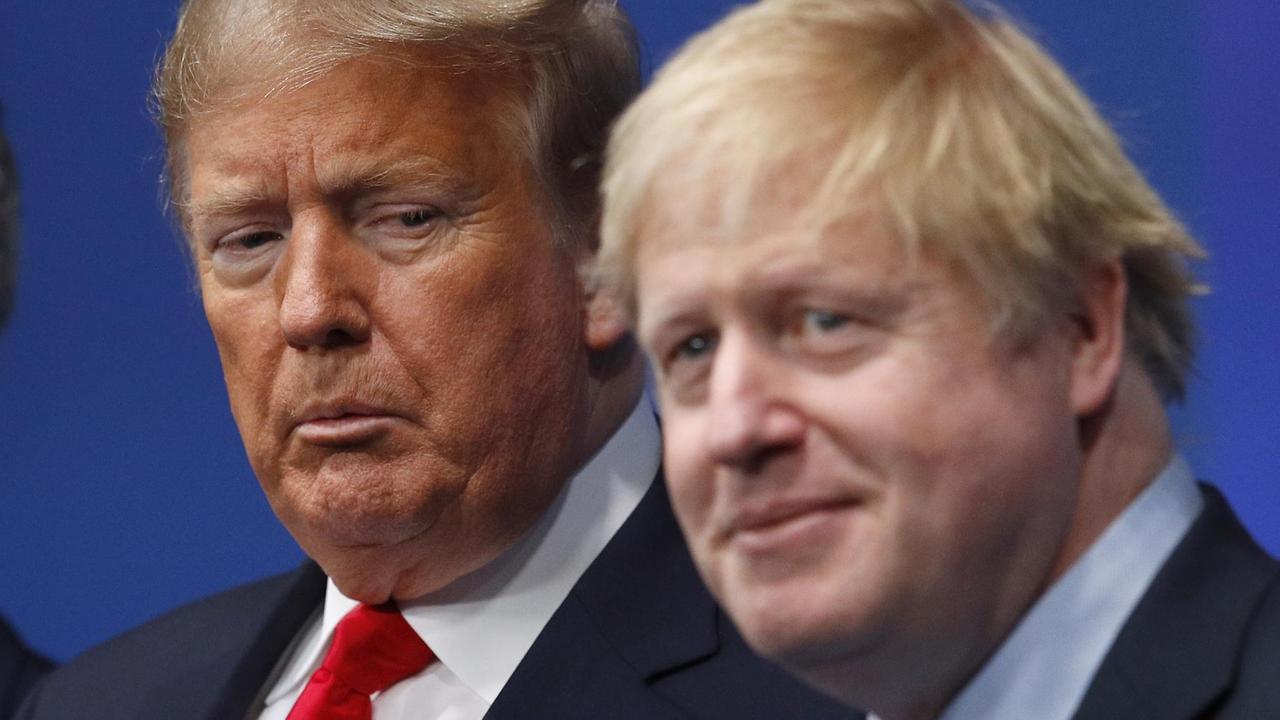 Die Köpfe von US-Präsident Donald Trump und dem britischen Premierminister Boris Johnson.