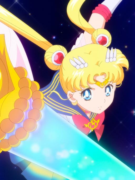 Eine Animefigur: ein Mädchen mit zwei blonden Zöpfen hält ein Zepter in der Hand. Es handelt sich um Sailor Moon.