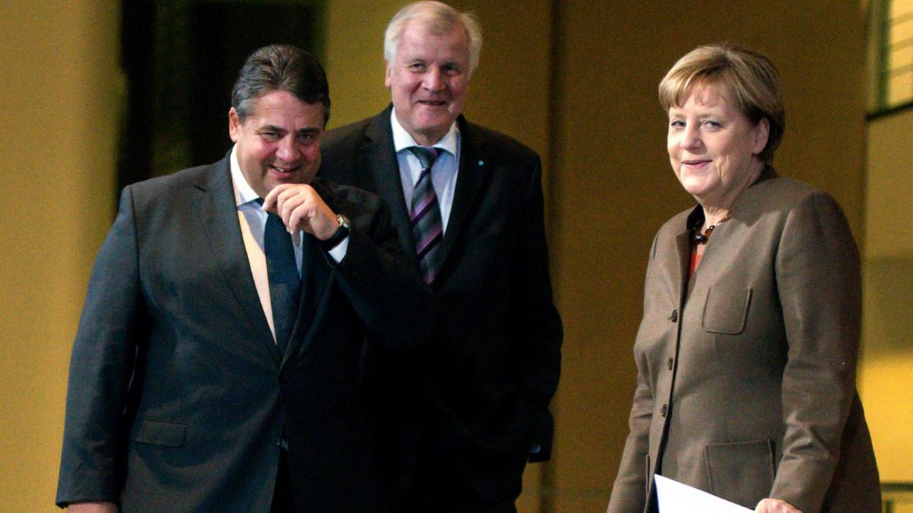 Bundeskanzlerin Merkel mit CSU-Chef Seehofer und SPD-Chef Gabriel